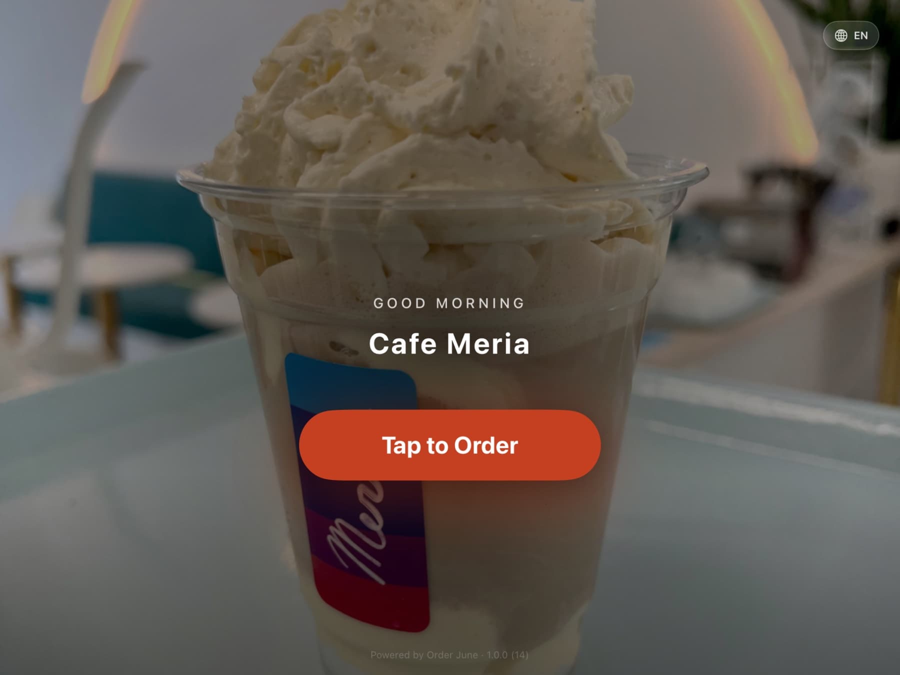 Order June on a landscape iPad — category sidebar on the left, a menu grid of photo tiles in the middle, and the live cart rail on the right